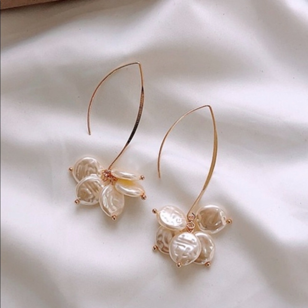 Pearl look dangle earrings